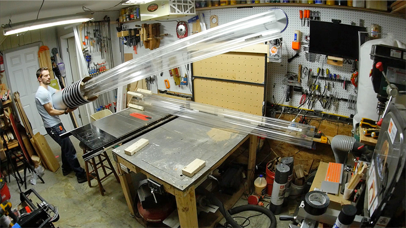 Illustration for article titled Guy Builds Gigantic Glowing Lightsabers For the Best Christmas Display Ever